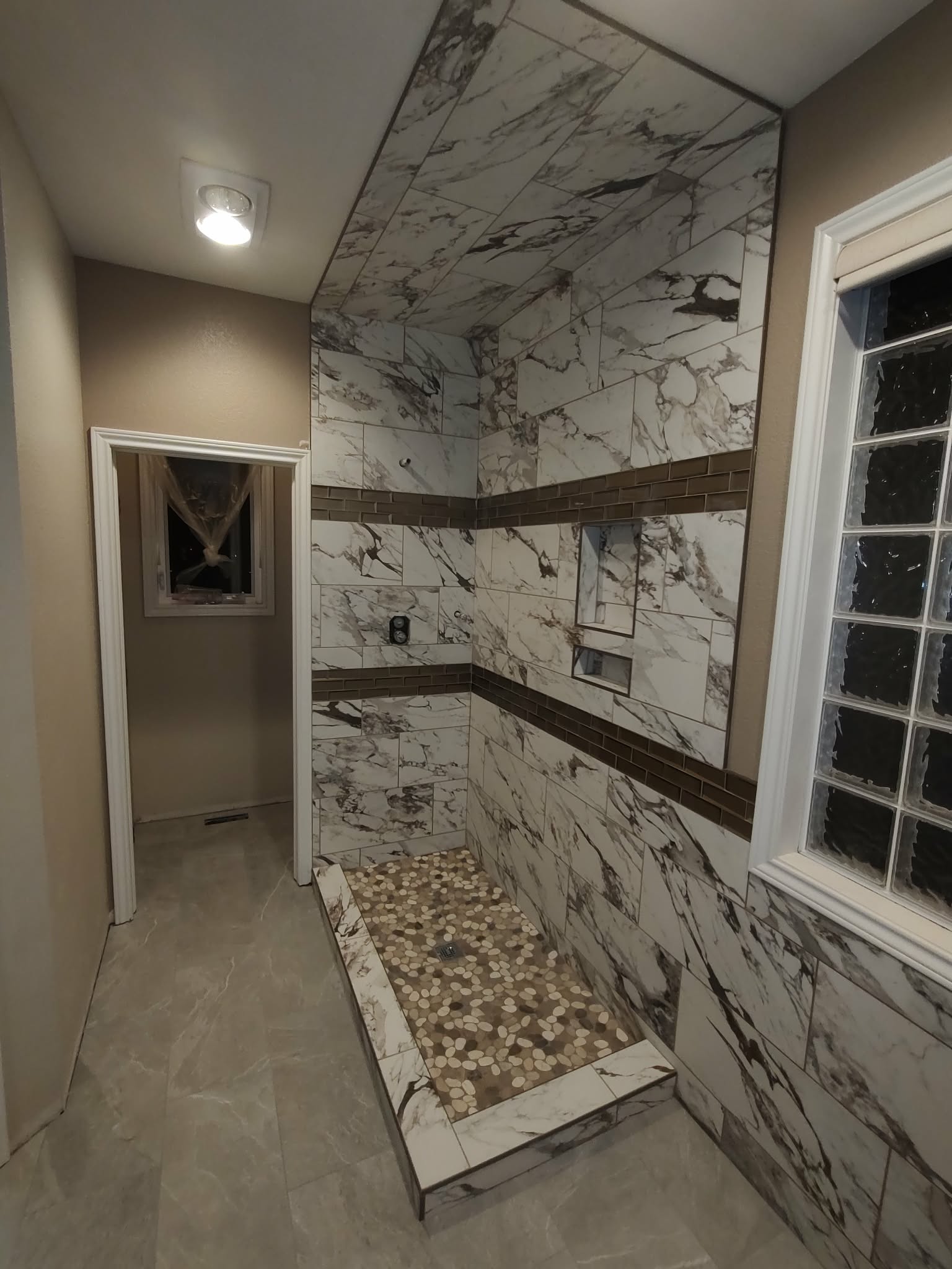 Large custom grey tiled shower